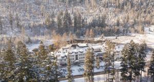 an aerial view of a building in the snow at Aries Hotel & SPA Wisła in Wisła