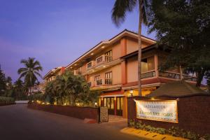 a large building with a sign in front of it at Lazy Lagoon, Baga A Lemon Tree Resort, Goa in Baga