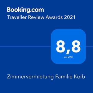 Certificado, premio, señal o documento que está expuesto en Zimmervermietung Familie Kolb
