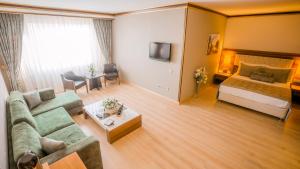 Postel nebo postele na pokoji v ubytování Yücesoy Liva Hotel Spa & Convention Center Mersin