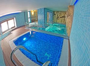 an overhead view of a swimming pool in a house at Hotel Villa Luisa in Pozzuoli