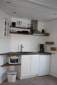 Kitchen o kitchenette sa Holiday-Skagen