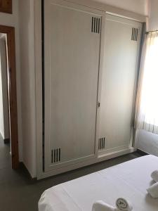 SOLMAR MENORCACOM 19客房内的一张或多张床位