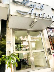 a store front of a store with a sign on it at Hotel Artico in Mar del Plata