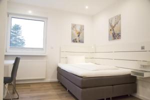 Postel nebo postele na pokoji v ubytování Main Motel