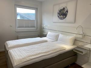 Postel nebo postele na pokoji v ubytování Main Motel
