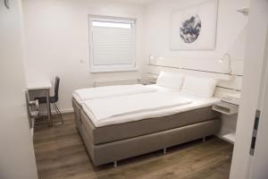 Postel nebo postele na pokoji v ubytování Main Motel
