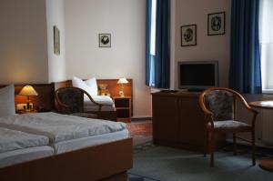 מיטה או מיטות בחדר ב-Hotel-Pension Seeblick
