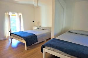 Postel nebo postele na pokoji v ubytování Chalet Laghel