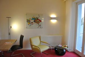 Zona de estar de Esprit-Art-Suitenappartements