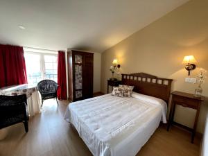 Postel nebo postele na pokoji v ubytování Arha Villa de Suances - Antiguo Albatros