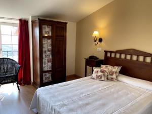 Postel nebo postele na pokoji v ubytování Arha Villa de Suances - Antiguo Albatros