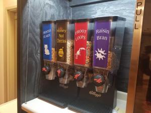 a refrigerator filled with lots of different types of food at Brook Pointe Inn in Syracuse