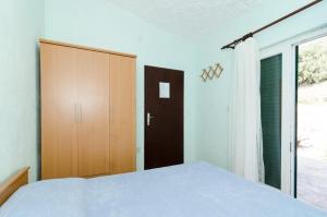 Postel nebo postele na pokoji v ubytování Holiday Home Jasminka