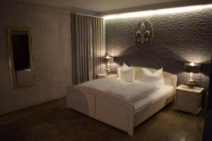 
Ein Bett oder Betten in einem Zimmer der Unterkunft Hotel Arte Vida
