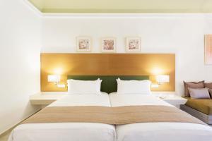 Postel nebo postele na pokoji v ubytování Hotel Riu Tikida Palmeraie - All Inclusive