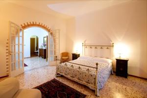 Cama o camas de una habitación en Hotel Il Vascello