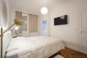 Ліжко або ліжка в номері Modern Duplex Close To The Eiffel Tower