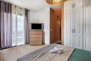 Telewizja i/lub zestaw kina domowego w obiekcie Candelaria Relax