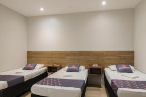 Mega Aeroporto Hotel Apenas 1 km de distância do Aeroporto de Fortaleza客房内的一张或多张床位