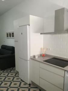 Kuchyň nebo kuchyňský kout v ubytování Apartamento Ara