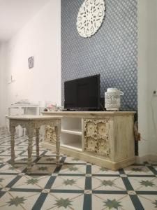 TV a/nebo společenská místnost v ubytování Apartamento Ara