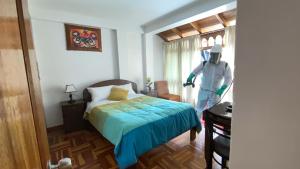 Postel nebo postele na pokoji v ubytování Hostal Comarca Imperial
