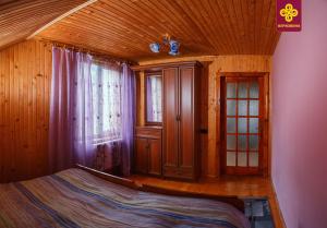 Postel nebo postele na pokoji v ubytování Садиба Анничка
