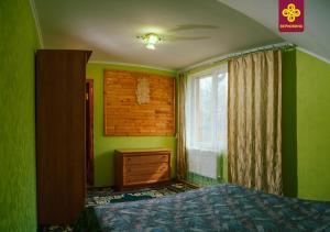 Postel nebo postele na pokoji v ubytování Садиба Анничка