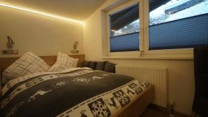 Postel nebo postele na pokoji v ubytování Apartment Fleißner