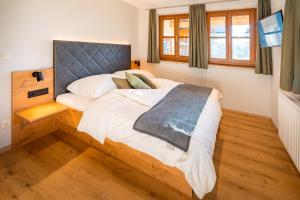 Postel nebo postele na pokoji v ubytování LakeSide Appartments