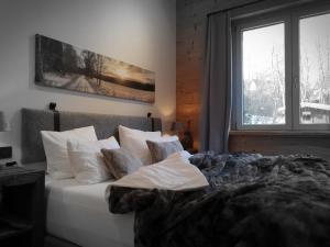 Postel nebo postele na pokoji v ubytování WLodgeOne