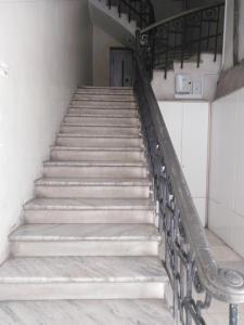 a set of stairs in a building at Karolou Dil central luxury and business appartment in Thessaloniki