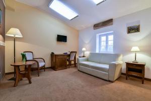 Postel nebo postele na pokoji v ubytování Hotel SPA Wieniawa