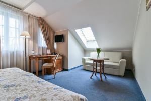 TV a/nebo společenská místnost v ubytování Hotel SPA Wieniawa