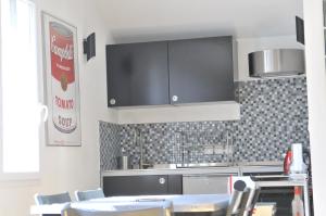 Kitchen o kitchenette sa Studio Alpins