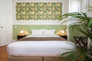 Letto o letti in una camera di Contador Mor Rooms and Apartments
