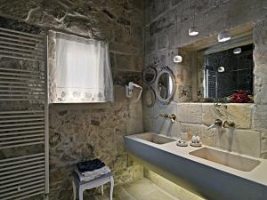 Koupelna v ubytování Relais Masseria Capasa