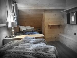 Postel nebo postele na pokoji v ubytování WLodgeOne