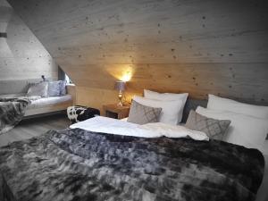 Postel nebo postele na pokoji v ubytování WLodgeOne