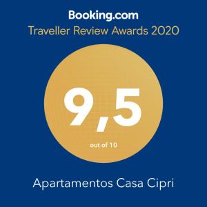 a yellow circle with the number inside at Apartamentos Casa Cipri in Playa Blanca