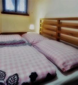 A bed or beds in a room at La Loggetta casa vacanze Még 33 kép