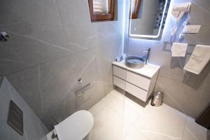 Łazienka w obiekcie Bella Apartments Zaton