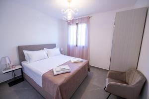 Posteľ alebo postele v izbe v ubytovaní Bella Apartments Zaton