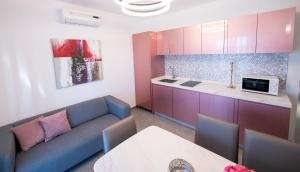 Kuchnia lub aneks kuchenny w obiekcie Bella Apartments Zaton