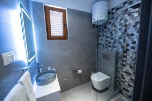 Łazienka w obiekcie Bella Apartments Zaton