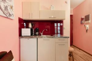 A kitchen or kitchenette at Manina Superior Apartment