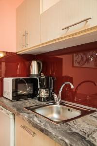 A kitchen or kitchenette at Manina Superior Apartment