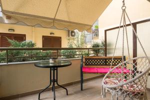 A balcony or terrace at Manina Superior Apartment