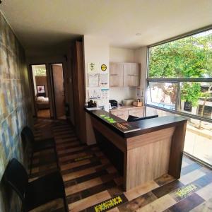 Kuchyň nebo kuchyňský kout v ubytování Hotel Barbacoa Uraba